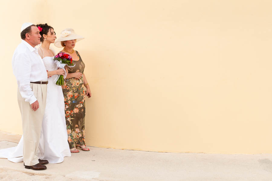 Bride and Parents, Waiting to Walk Down The Aisle